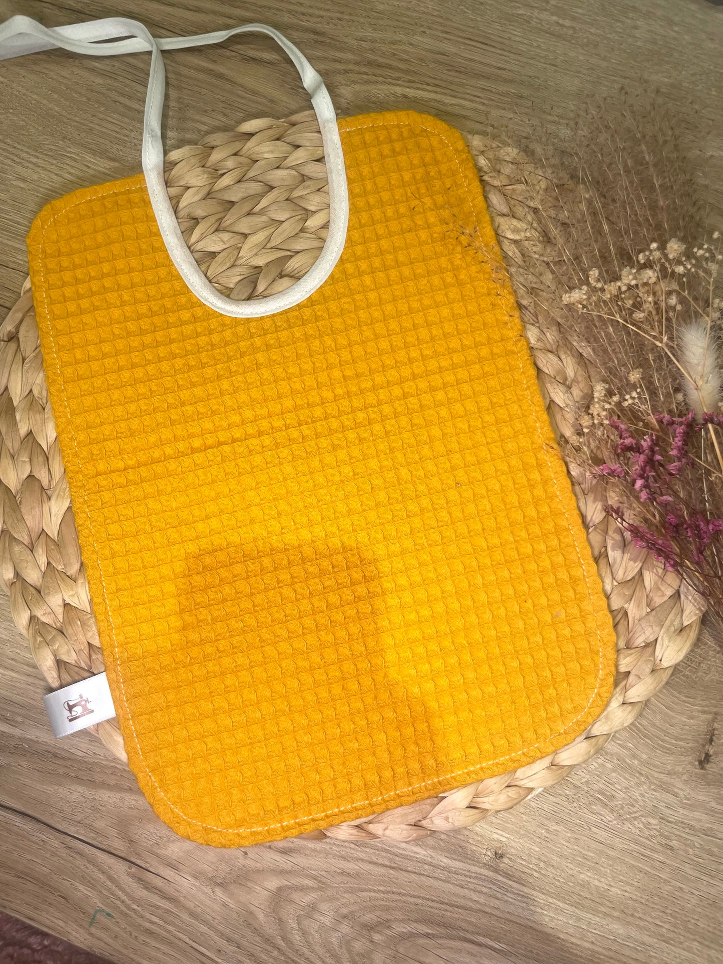 Grand bavoir feuille jaune