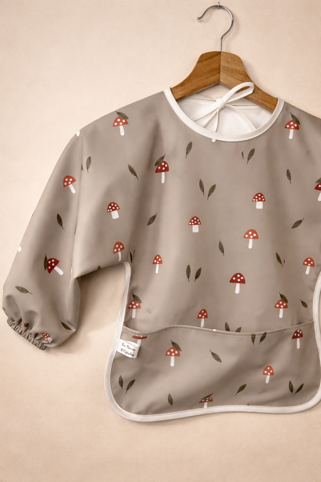 Tablier à manches champignons