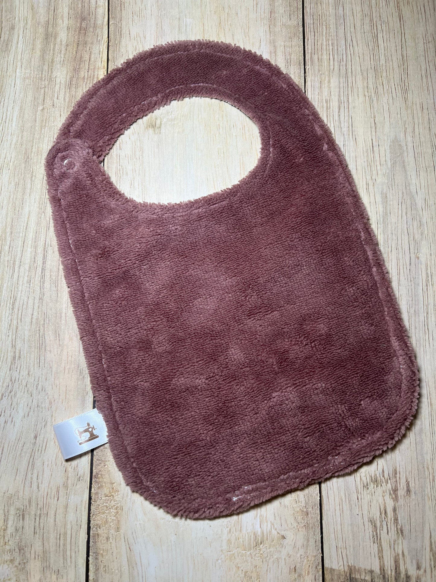 Bavoir Paola pourpre