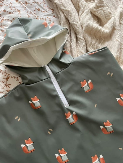 Poncho de pluie / coupe vent