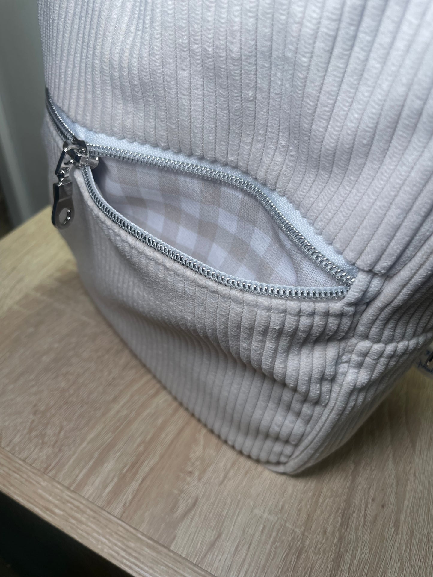 Sac à dos zippé beige et Vichy