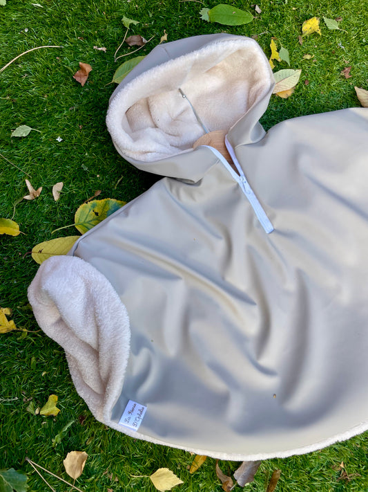 Poncho imperméable beige uni