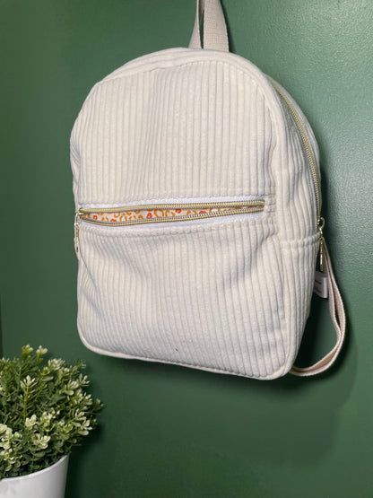 Sac a dos zippé beige